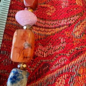 Unique necklace with variety of colors.